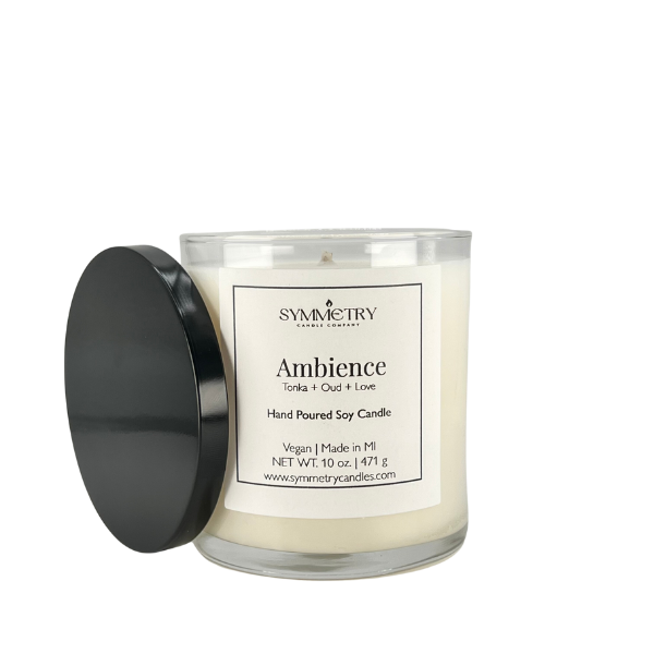 Our Ambience candle is a romantic blend of fragrances that titillate senses. The intertwining of amaretto, tonka, and resinous oud with rum, peach, and cherry blossom creates a seductive and arousing aroma. This candle is sure to create an atmosphere perfect for self-care, relaxation, or romance. The choice is yours!